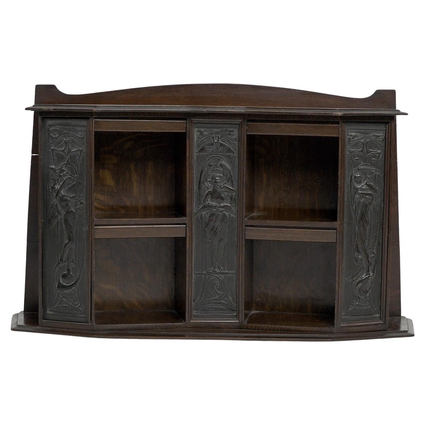 Arts and Crafts oak desk top bookcase with 3 bronze Art Nouveau period plaques. For Sale