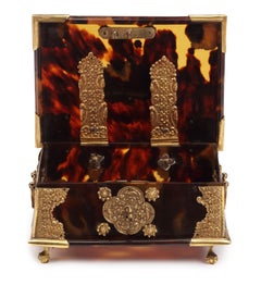 A small Dutch colonial Indonesian tortoiseshell betel box with gold mounts