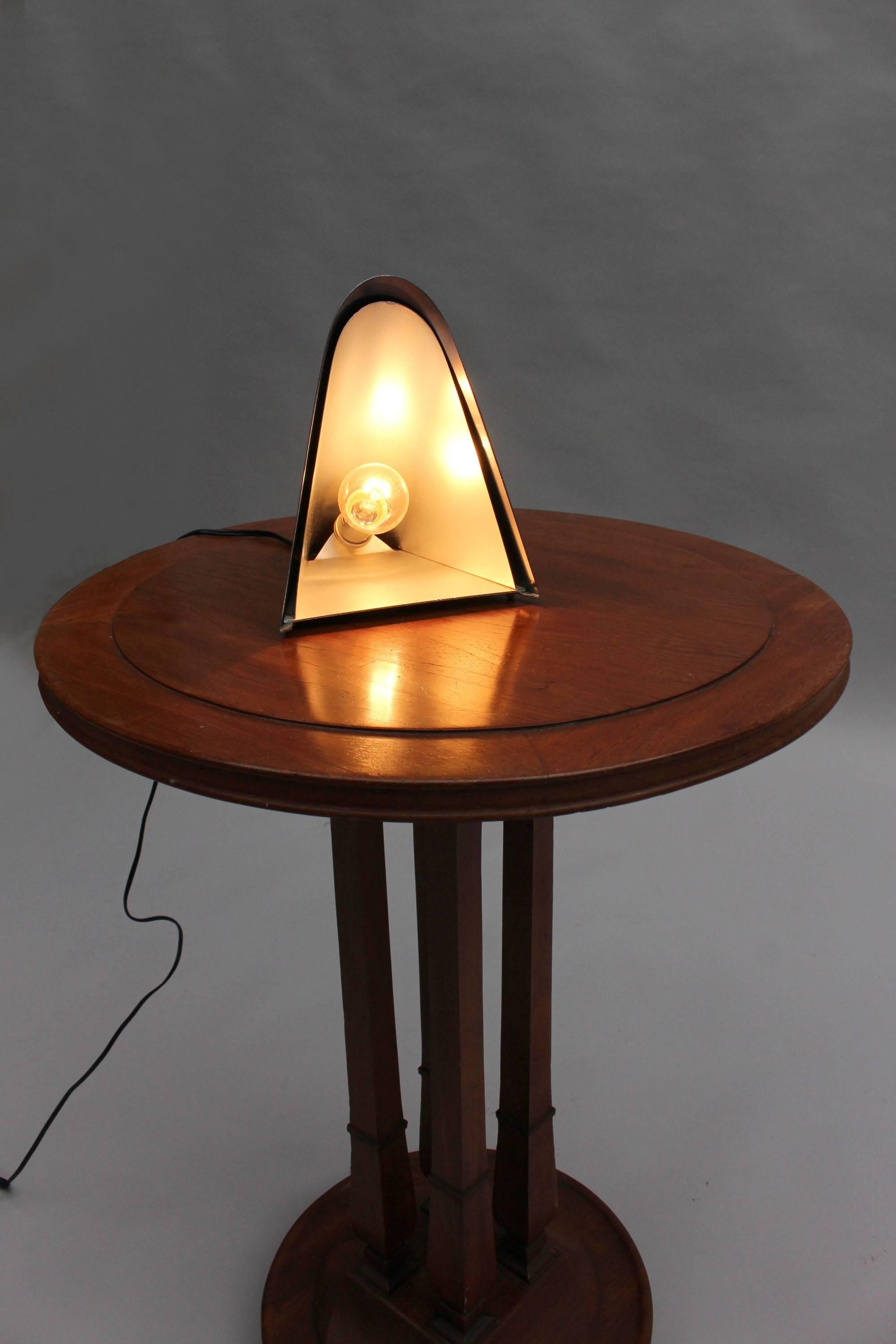A small French 1960s black lacquered metal table Lamp by Perzel.