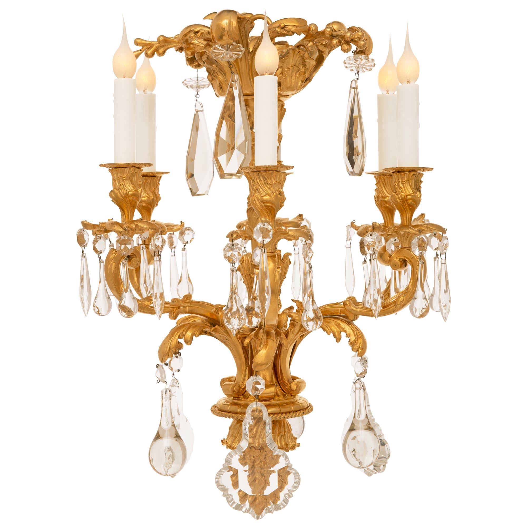 A small French 19th century Louis XV st. Ormolu and Crystal chandelier In Good Condition For Sale In West Palm Beach, FL