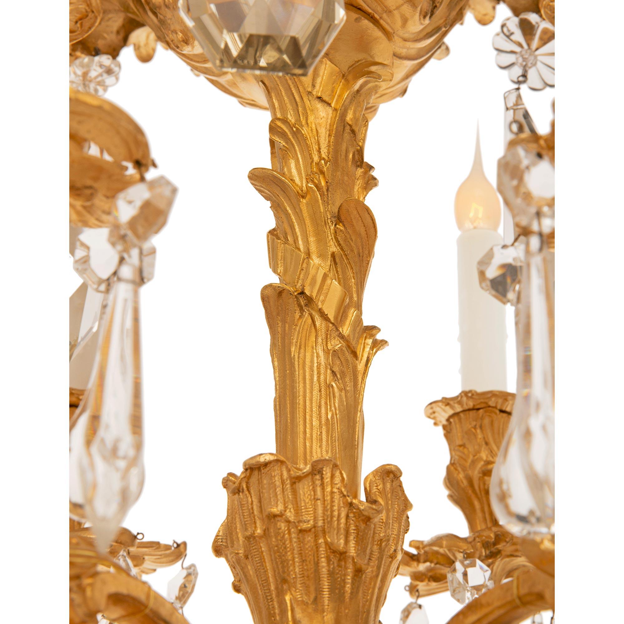 A small French 19th century Louis XV st. Ormolu and Crystal chandelier For Sale 1
