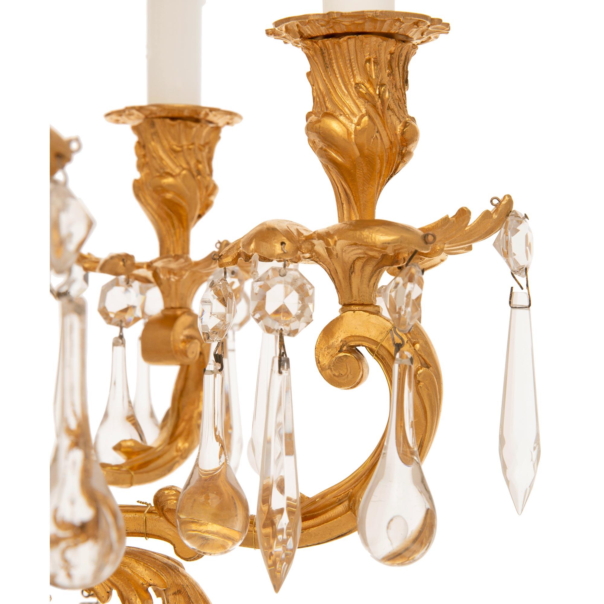 A small French 19th century Louis XV st. Ormolu and Crystal chandelier For Sale 2