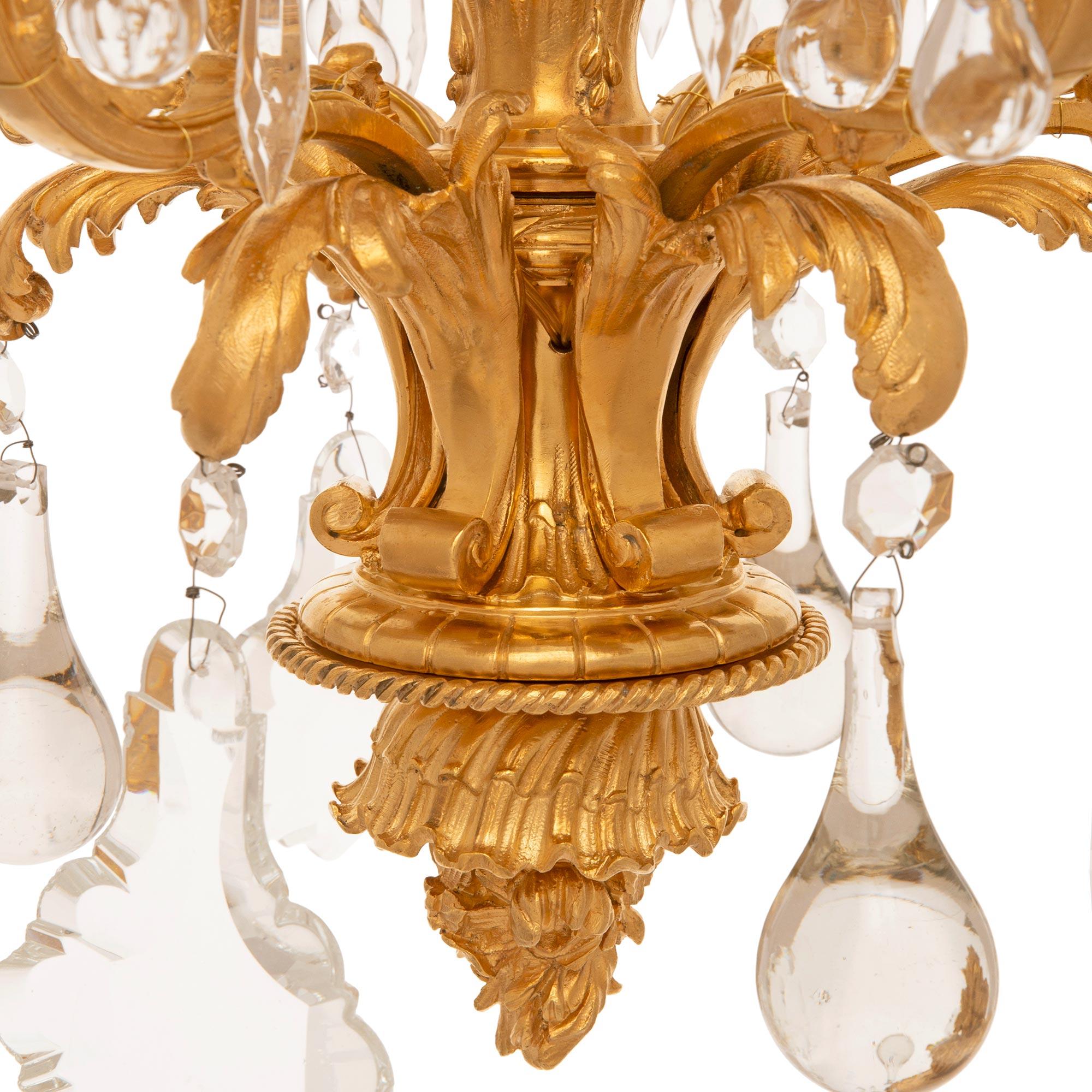 A small French 19th century Louis XV st. Ormolu and Crystal chandelier For Sale 3