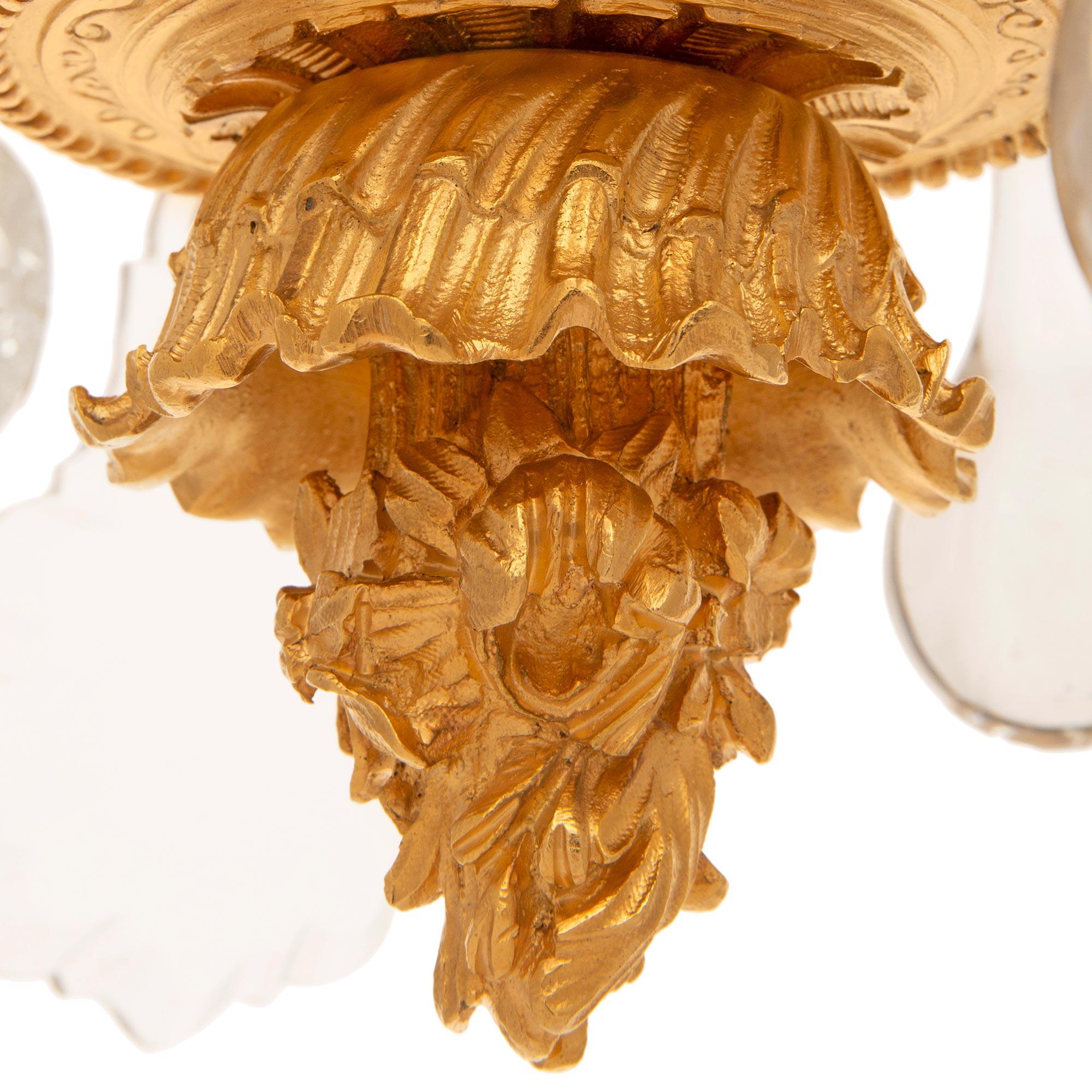 A small French 19th century Louis XV st. Ormolu and Crystal chandelier For Sale 4