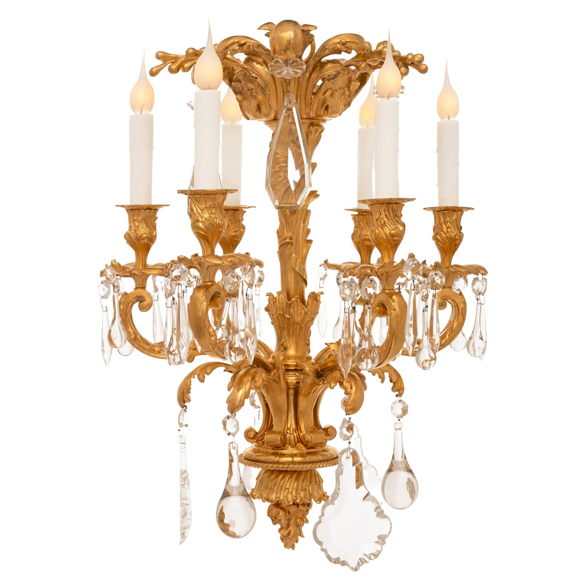 A small French 19th century Louis XV st. Ormolu and Crystal chandelier