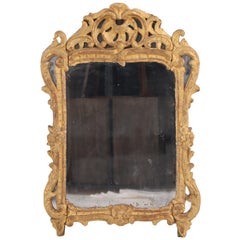 A Small French Giltwood and Carved Mirror, 18th C.