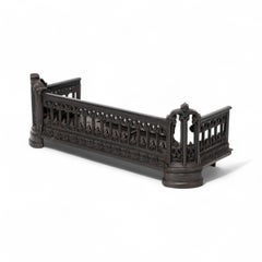 A Small Gothic Revival Cast Iron Fender with Pierced Trefoil Decoration