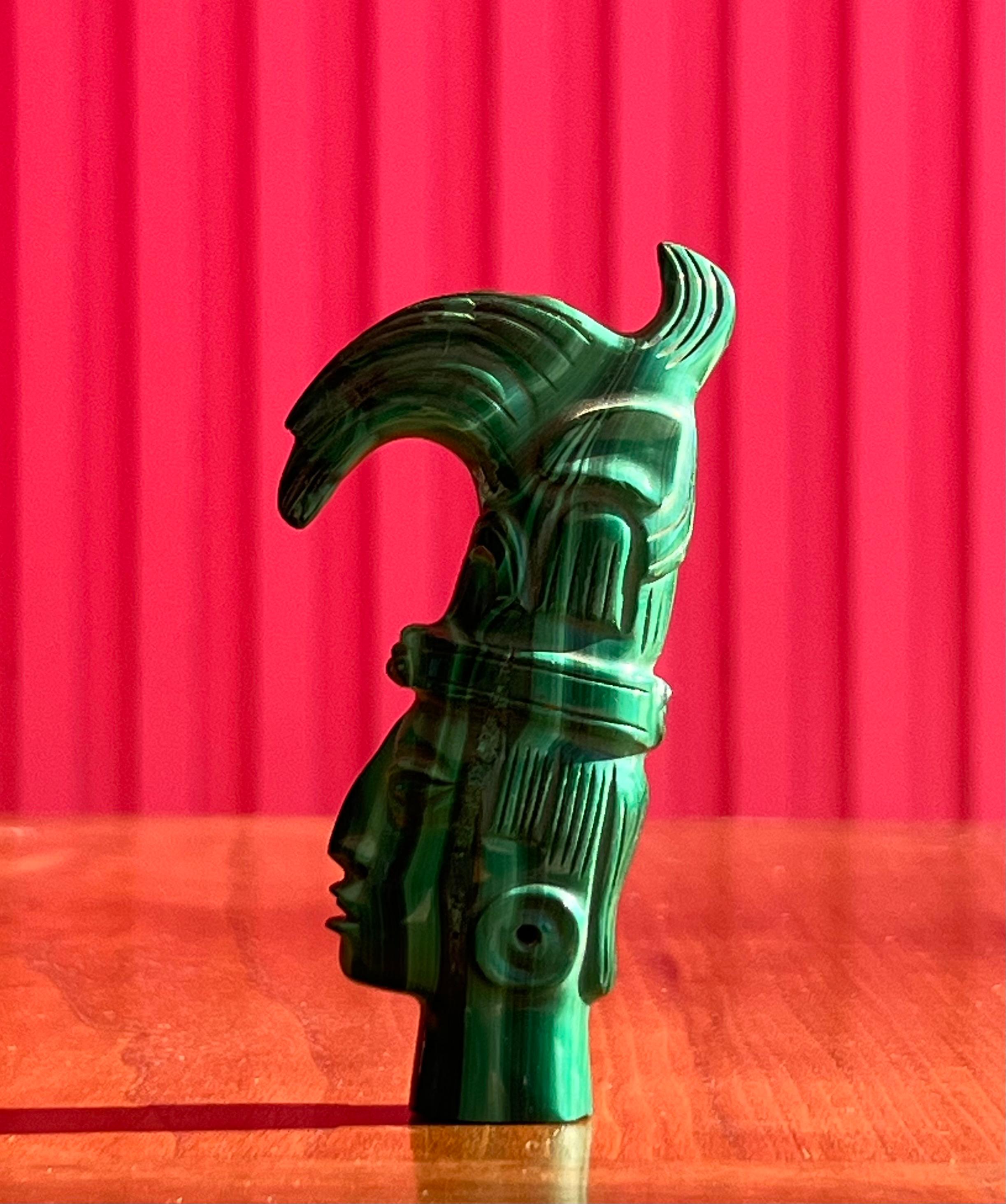 Unknown A small hand-carved malachite sculpture of an indigenous tribesman, 20th century For Sale
