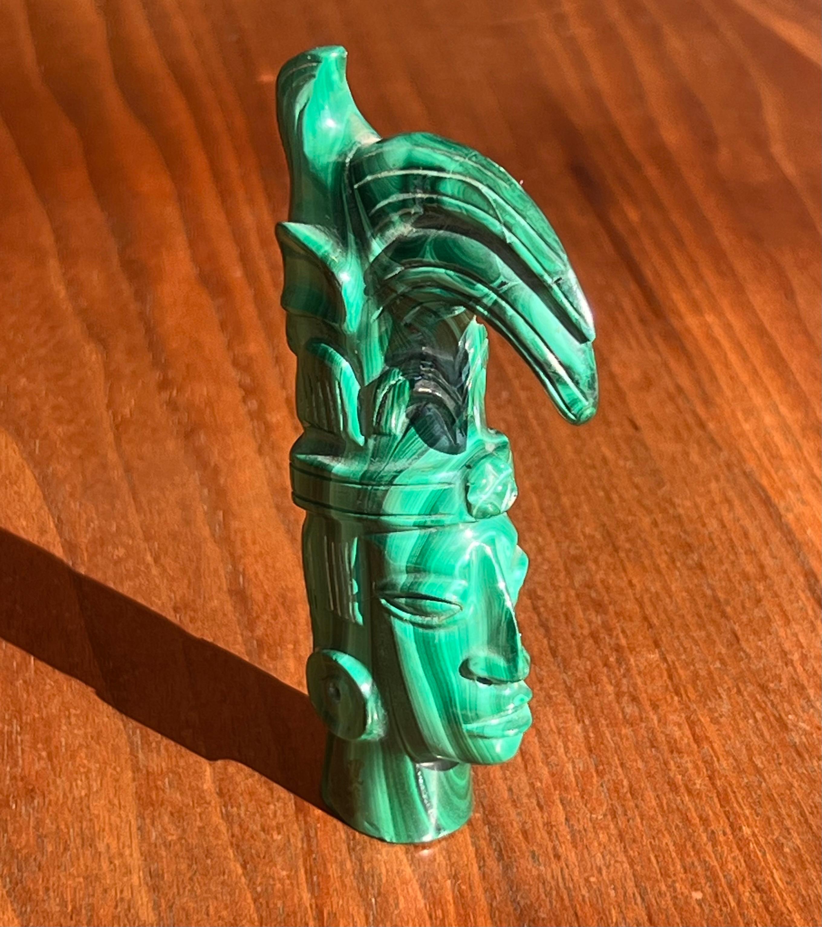 Malachite A small hand-carved malachite sculpture of an indigenous tribesman, 20th century For Sale
