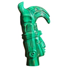 A small hand-carved malachite sculpture of an indigenous tribesman, 20th century