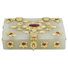 A small Mughal gold jade box with rubies and diamond
