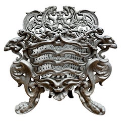 Un petit  Grille de charbon française ornée