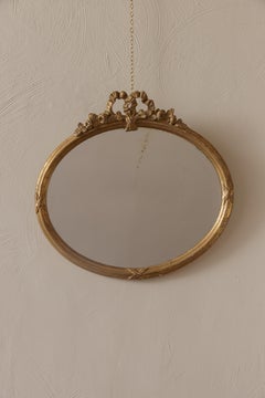 A Small Oval Mirror