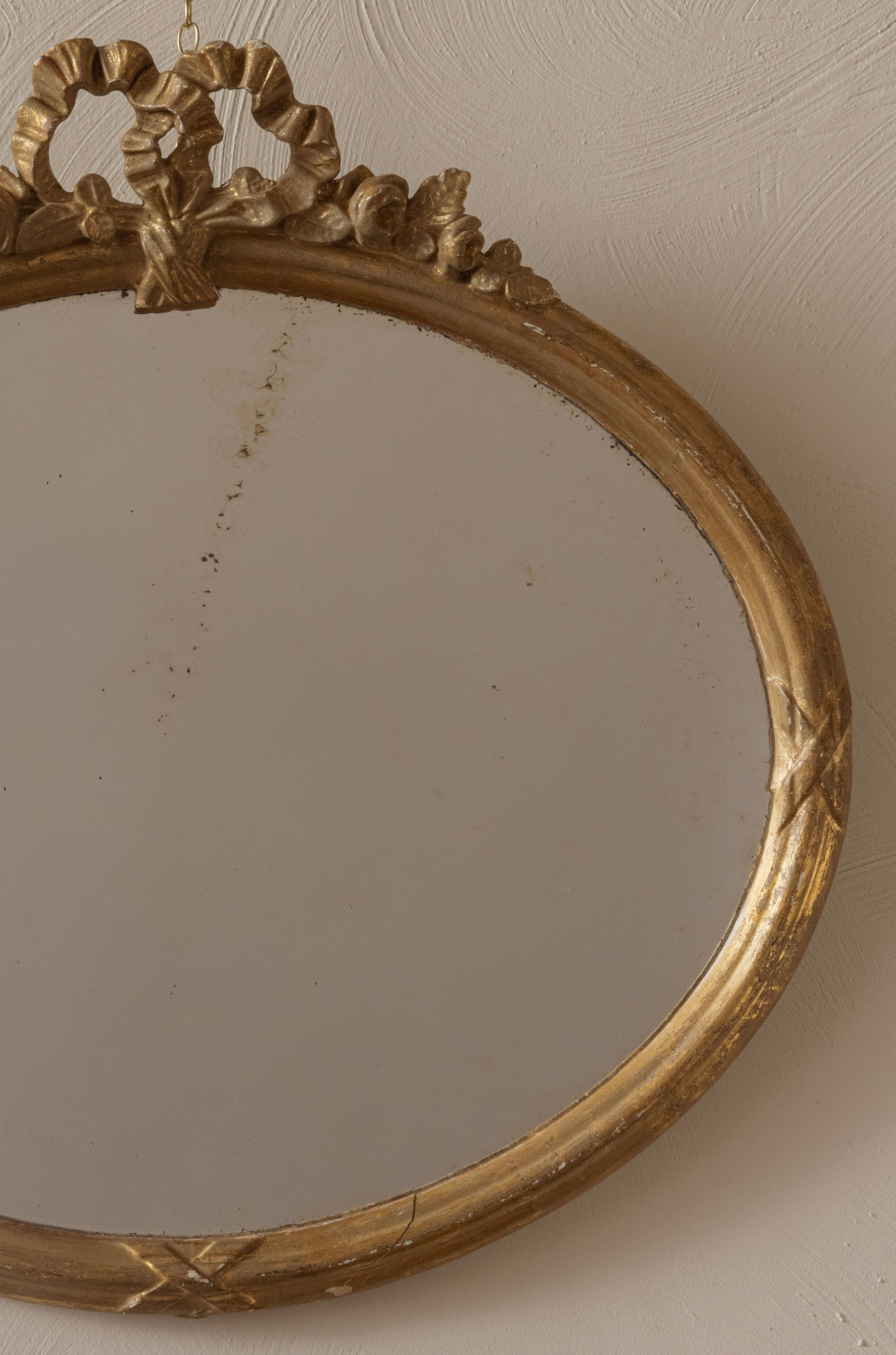French A Small Oval Mirror For Sale