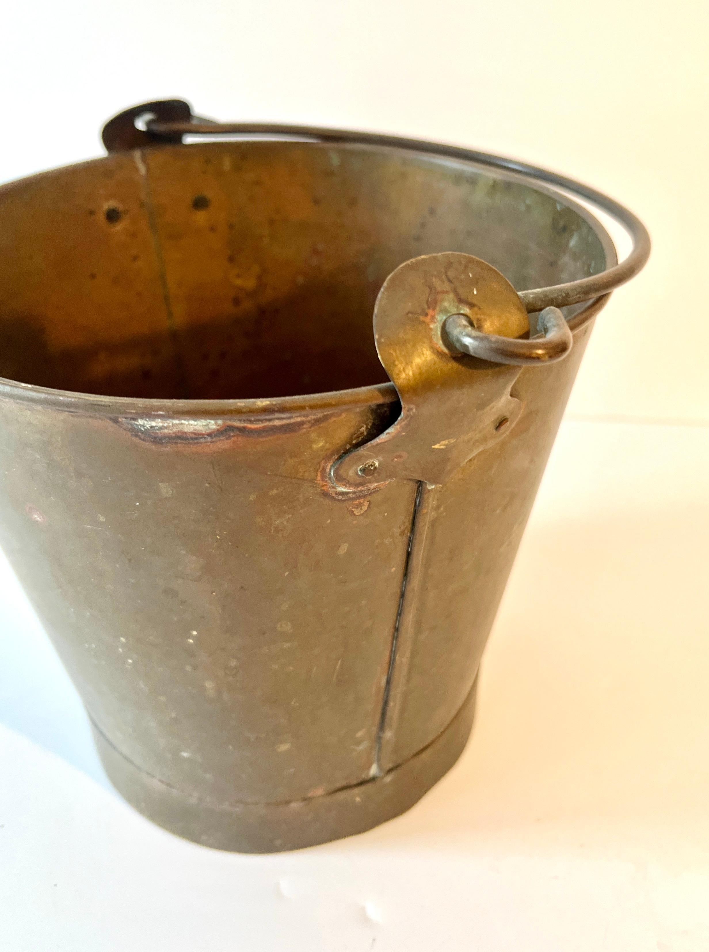 Rustic A Small Patinated Brass Pail with Handle For Sale