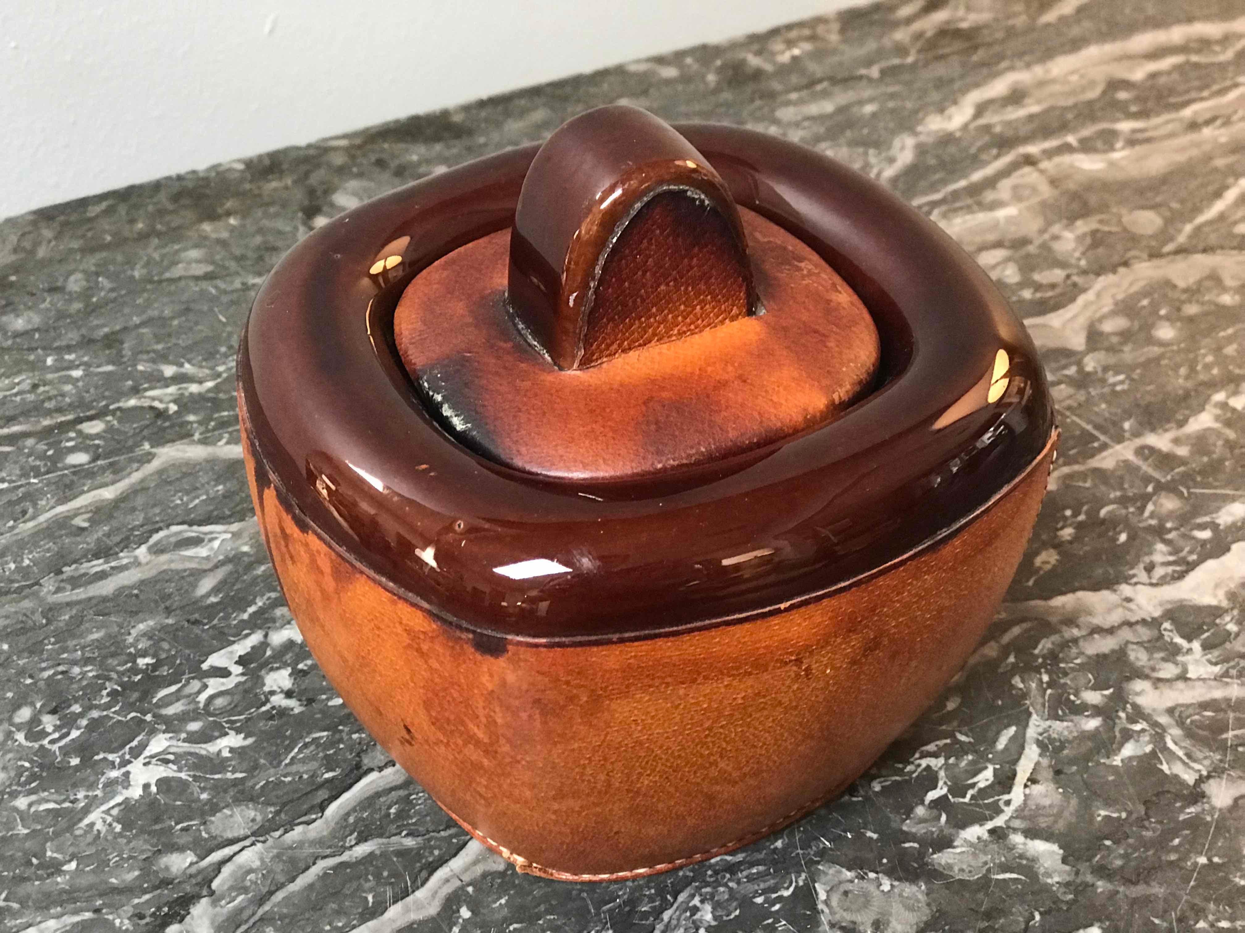 Edwardian A Small Pottery Jar with Brown Leather Decoration and Lid