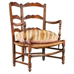 Antique A Small Provenaçal Love Seat with a Needlework Cushion