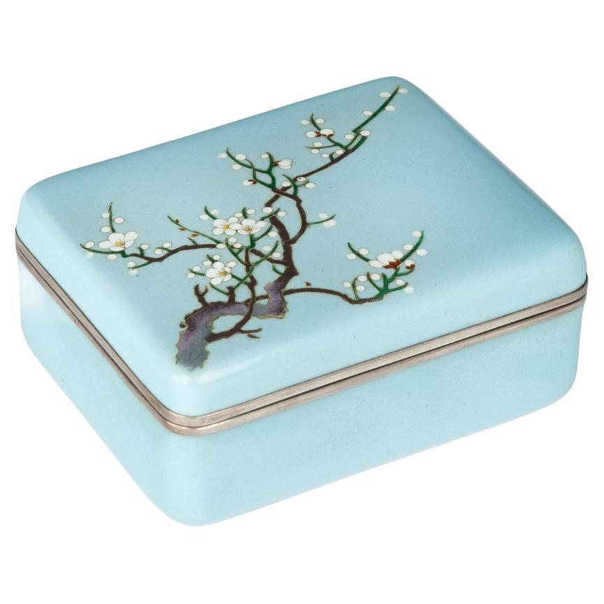 A small Showa period cloisonné box with a single branch of blossom For Sale