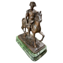 Sculture figurative in metallo
