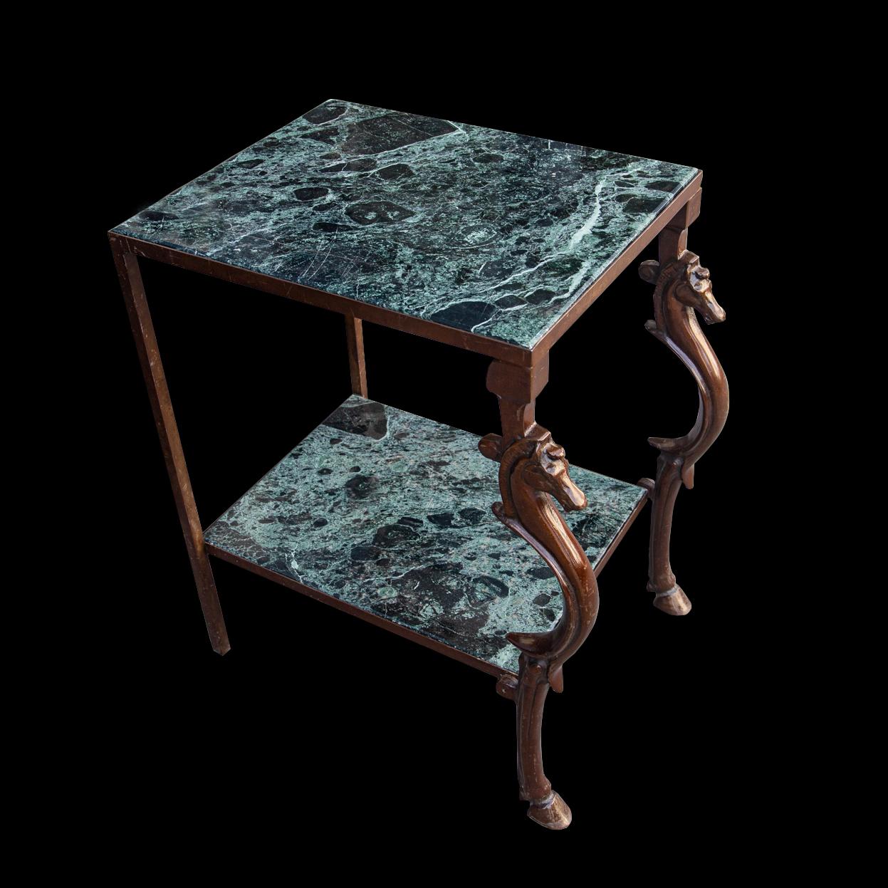 Exceptional quality patinated bronze with sculptural detail - a brace of facing sea horses which terminate gracefully into hooved feet. Featuring two levels in verde marble with wonderful colouration. Sourced from Claridge's the grand landmark hotel