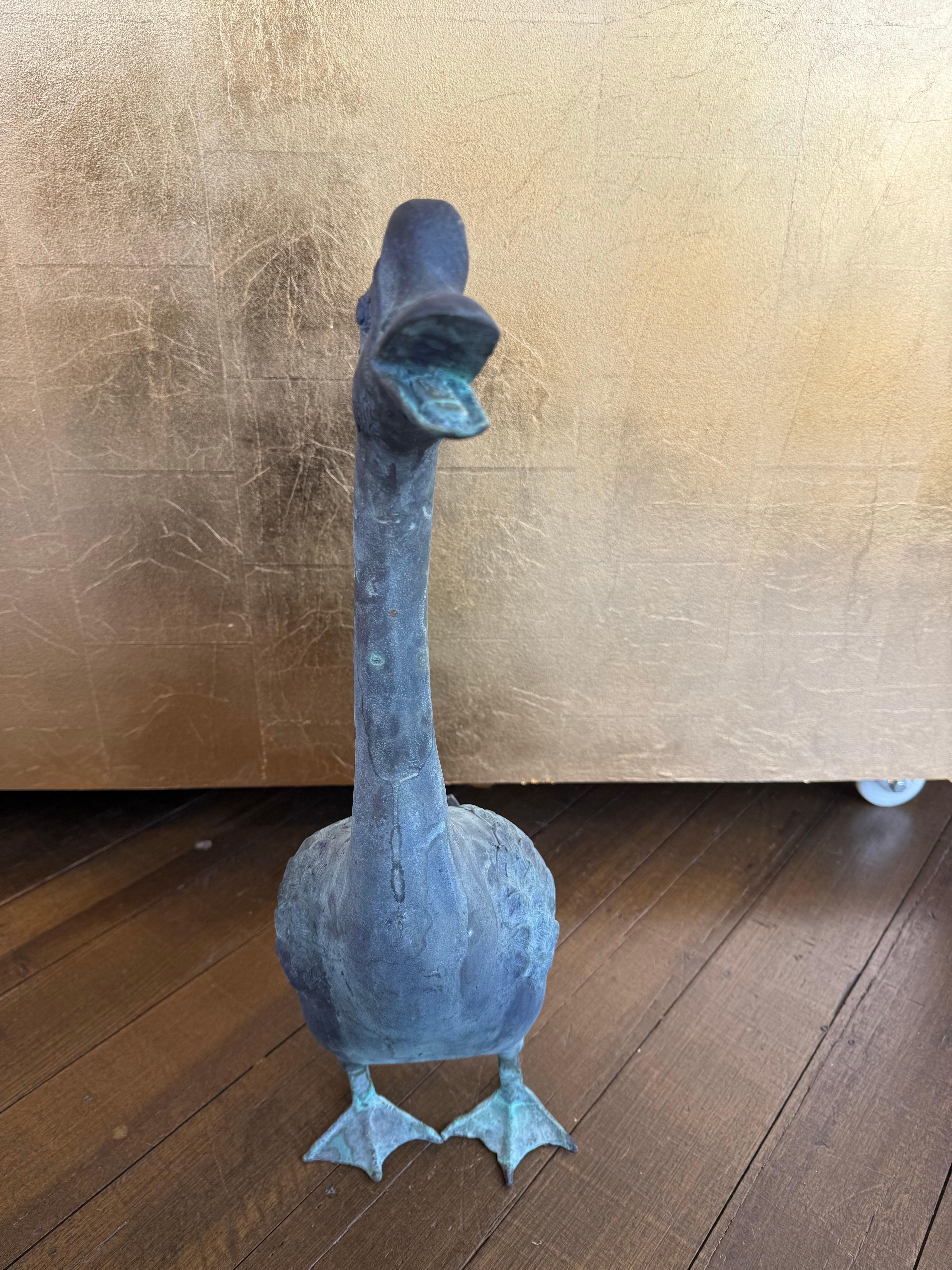 A Solid Cast Bronze Goose with Open Mouth

Provenance: Private Australian Collection.

Dimensions:
Height: 59cm.
Width: 38cm.
Depth: 16cm.