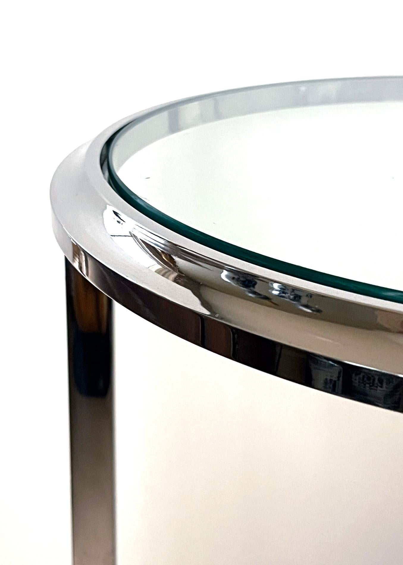 American A Solid Chrome-plated Steel Circular Occasional Table with Glass Top For Sale