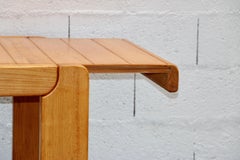 A solid elm extensible dining table, France, 1960s