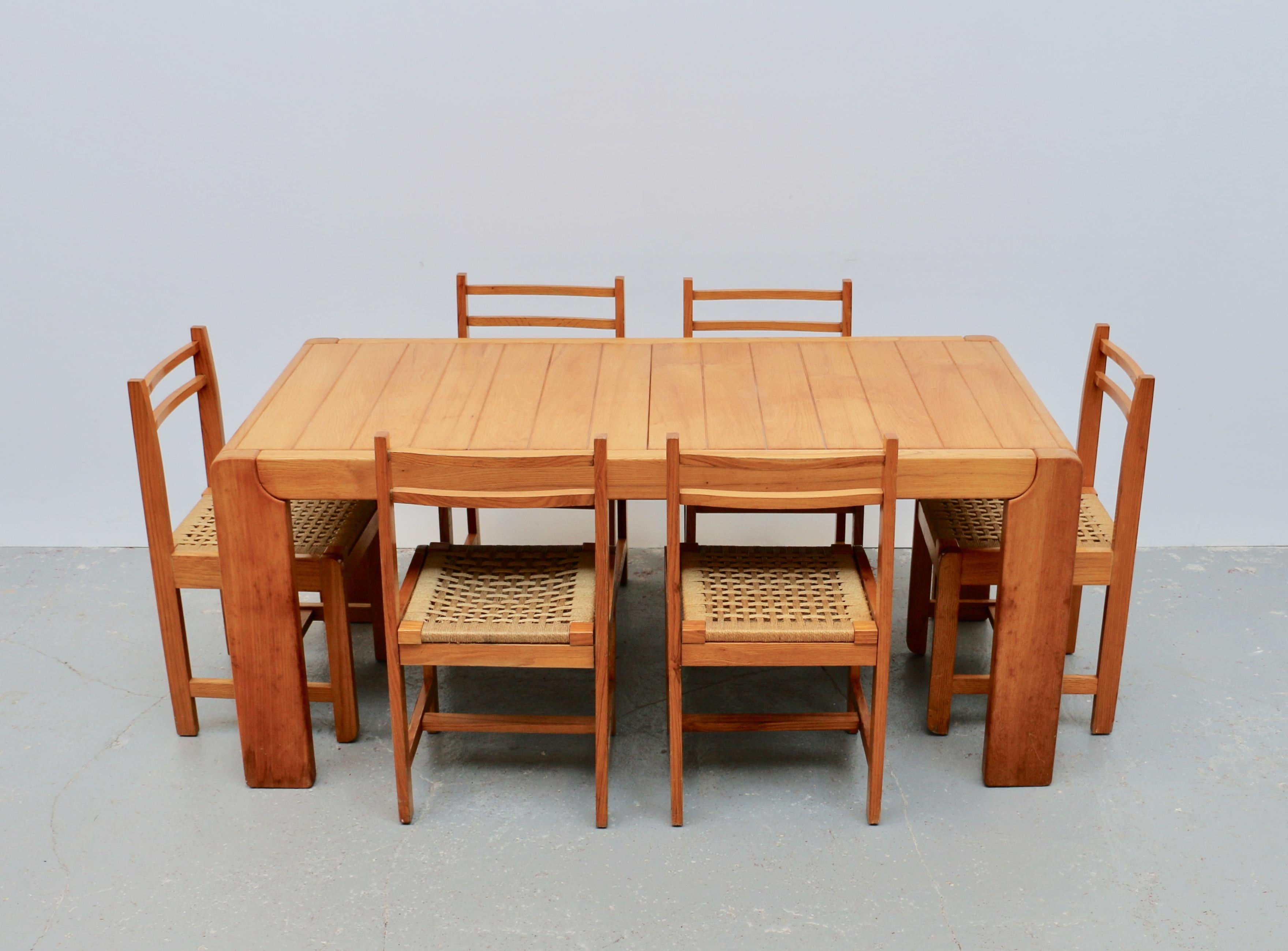 Elm A solid elm extensible dining table, France, 1960s For Sale