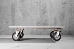A Solid Industrial Coffee Table With Carrara Marble Top