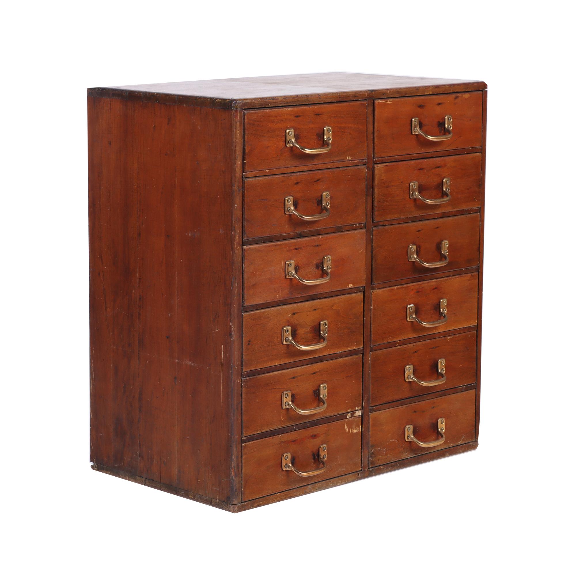 A solid Mahogany 12 drawer chest. Circa 1960's. American. Brass drawer pulls.