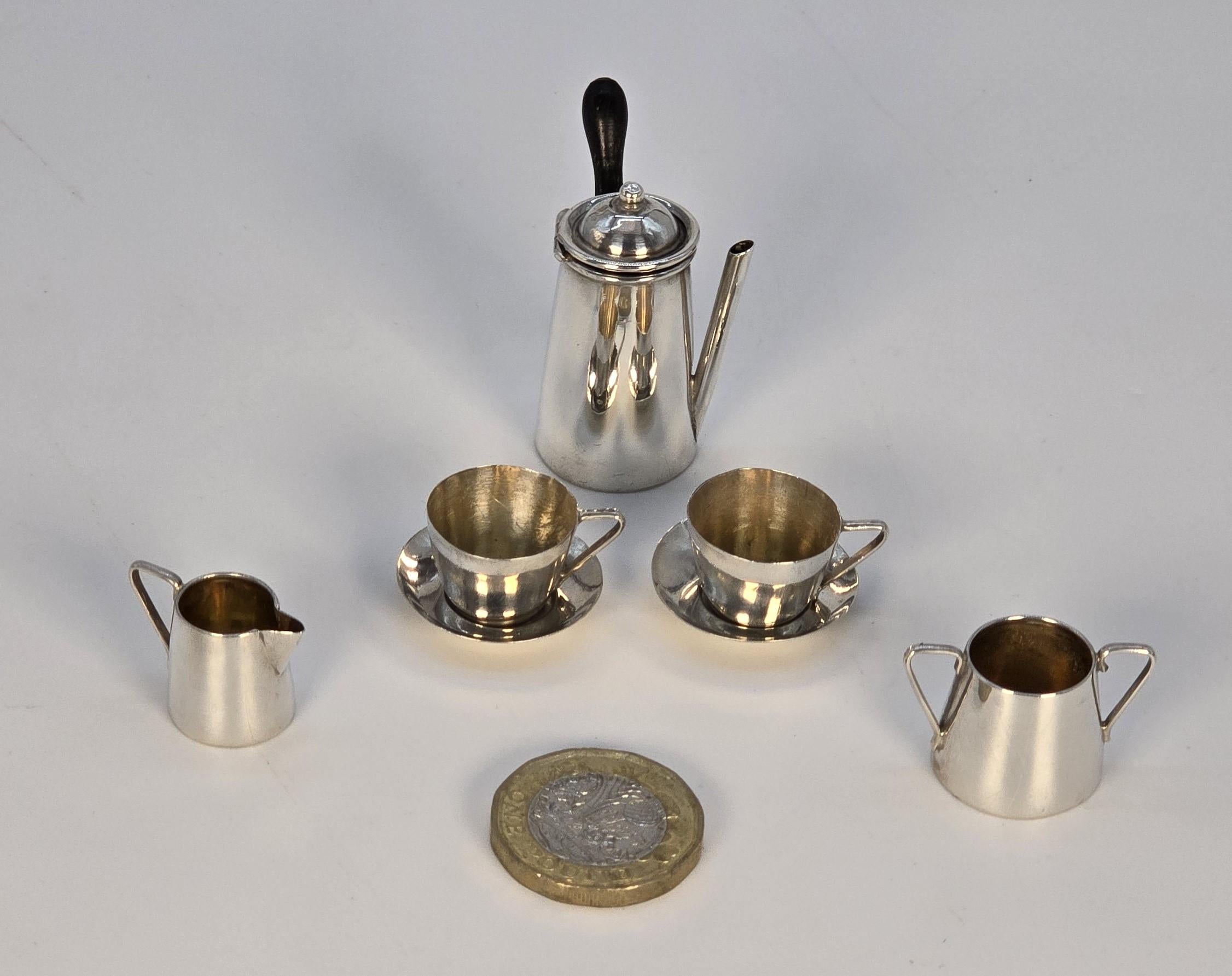 A solid silver miniature chocolate pot set, English made in 1905, Birmingham For Sale 11
