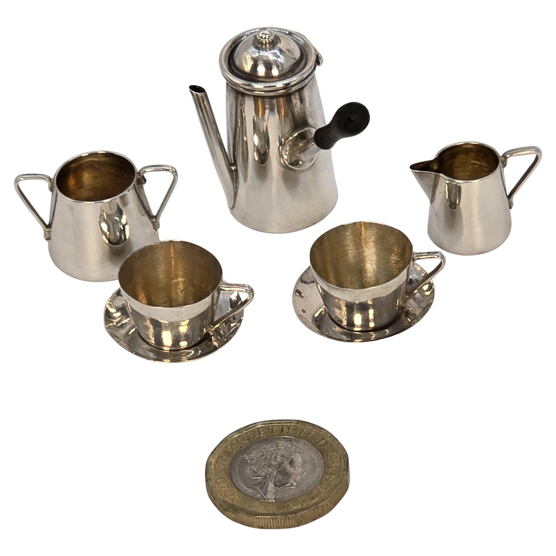 A solid silver miniature chocolate pot set, English made in 1905, Birmingham For Sale