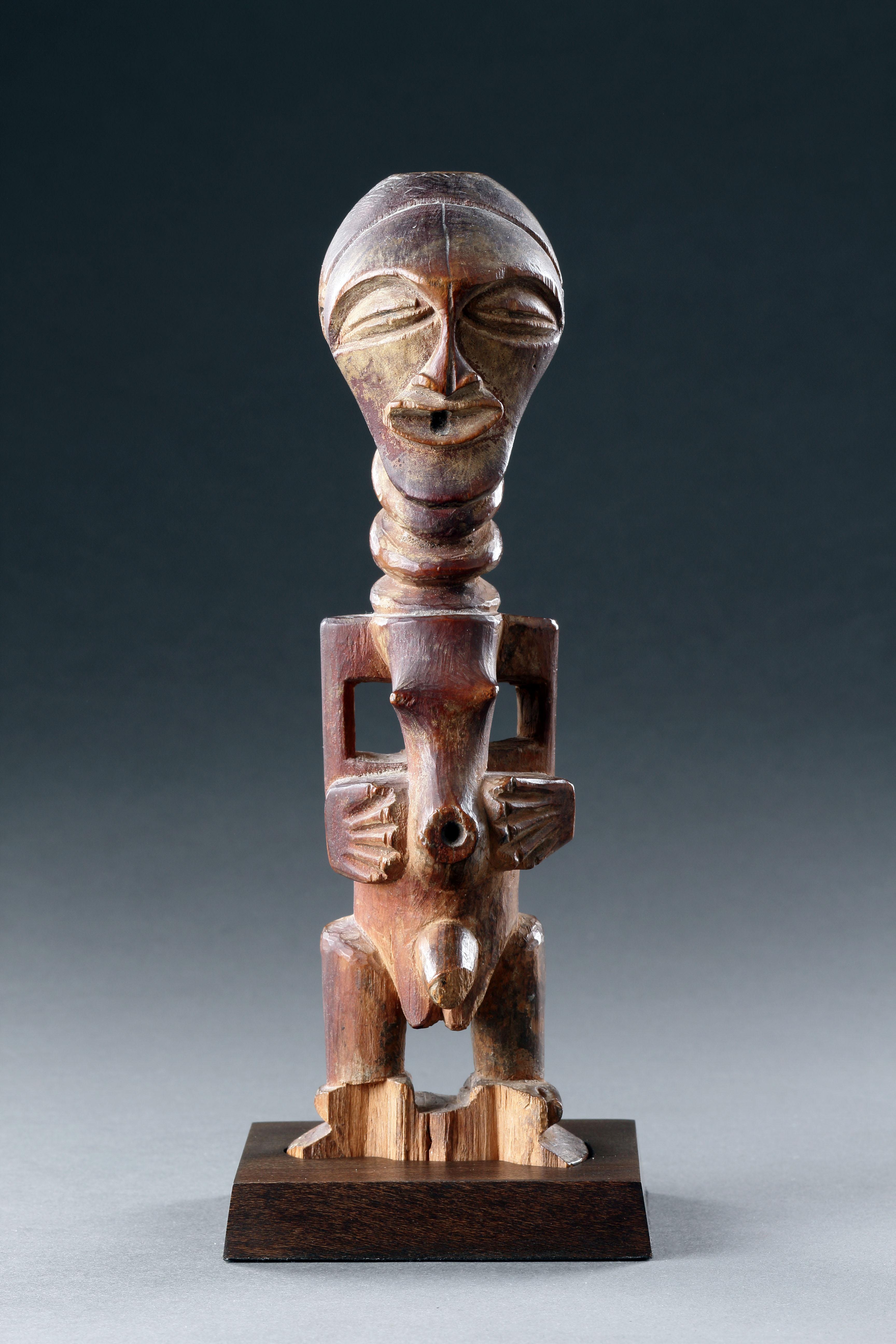 A Songye Male ‘Power’ Figure 
Open aperture to the head and stomach
Fine overall patina, loss to feet
Democratic Republic of Congo 

19th Century 

Size: 23cm high - 9 ins high

The Michel Gaud collection 
Sothebys Important African Art: ‘The Michel