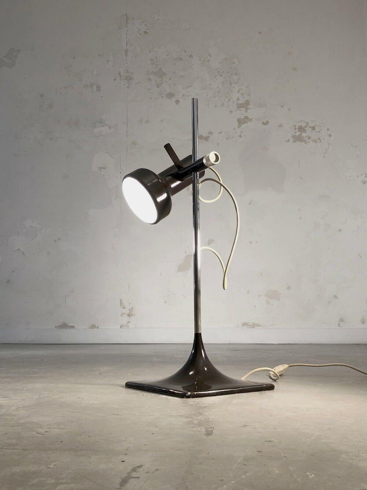 A table or desk lamp, Post-Modernist, Free-Form, Seventies, Space-Age, square base with rounded lines in brown lacquered metal, vertical stem in chrome-plated metal, adjustable spotlight in brown lacquered metal, model F-162 by Etienne Fermigier,
