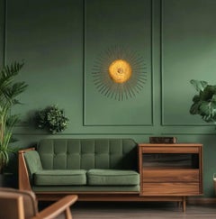 A Spanish 1950s gilt wrought iron sunburst wall / ceiling light