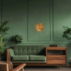 A Spanish 1950s gilt wrought iron sunburst wall / ceiling light.