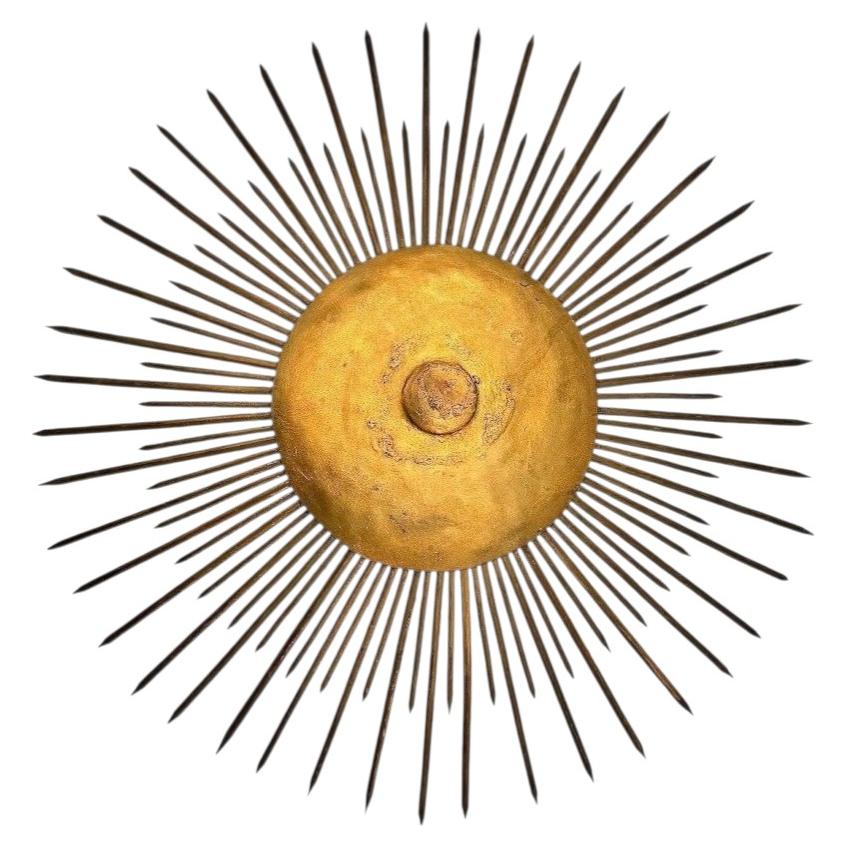 A Spanish 1950s gilt wrought iron sunburst wall / ceiling light