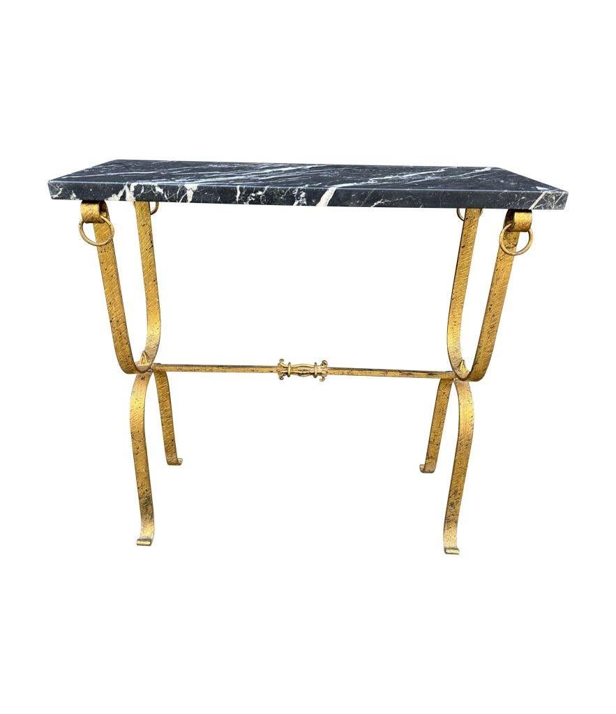 A Spanish 1950s wrought iron gilt console table with Nero Marquina marble top For Sale 10