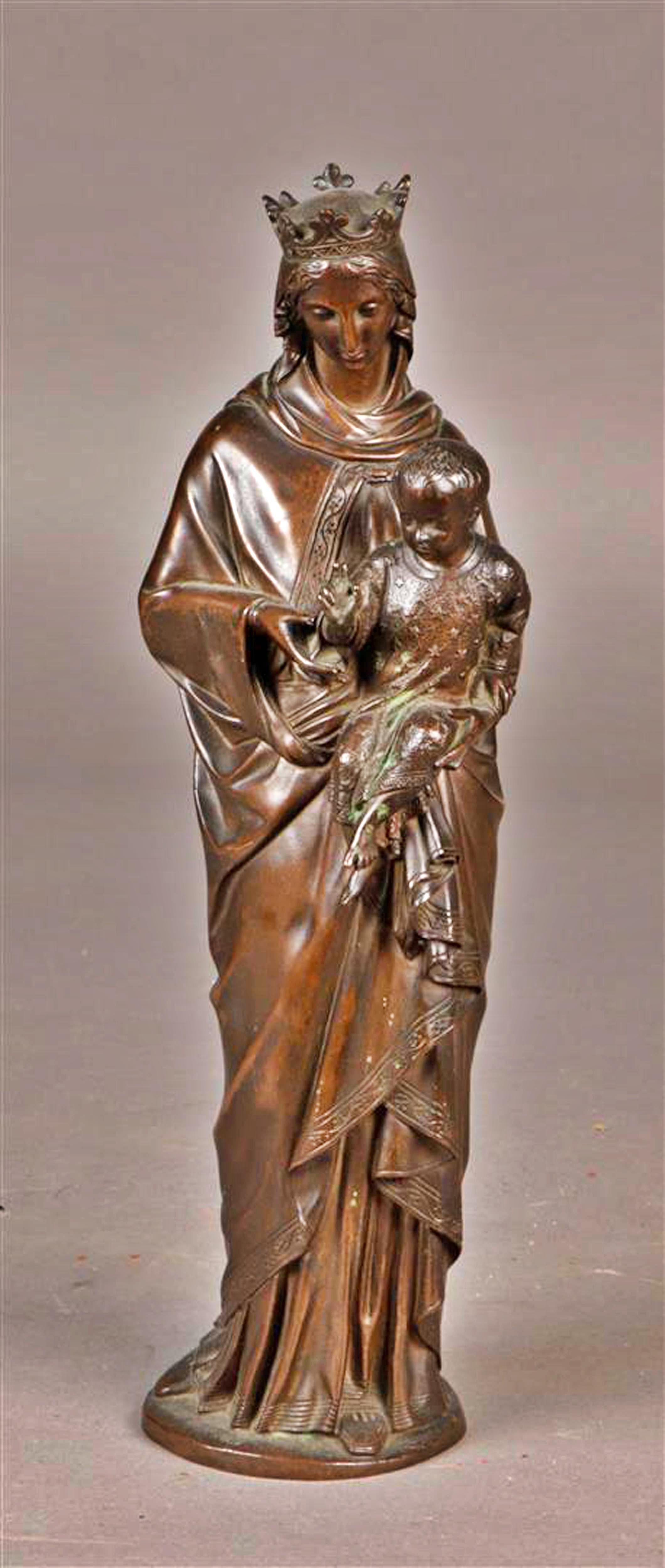 A Spanish bronze sculpture end 19th century
depicting the Holy Mary with the Christ Child. 
So-called: Sedes Sapientiae. 
Measure: H.: 33 cm
very good condition.
