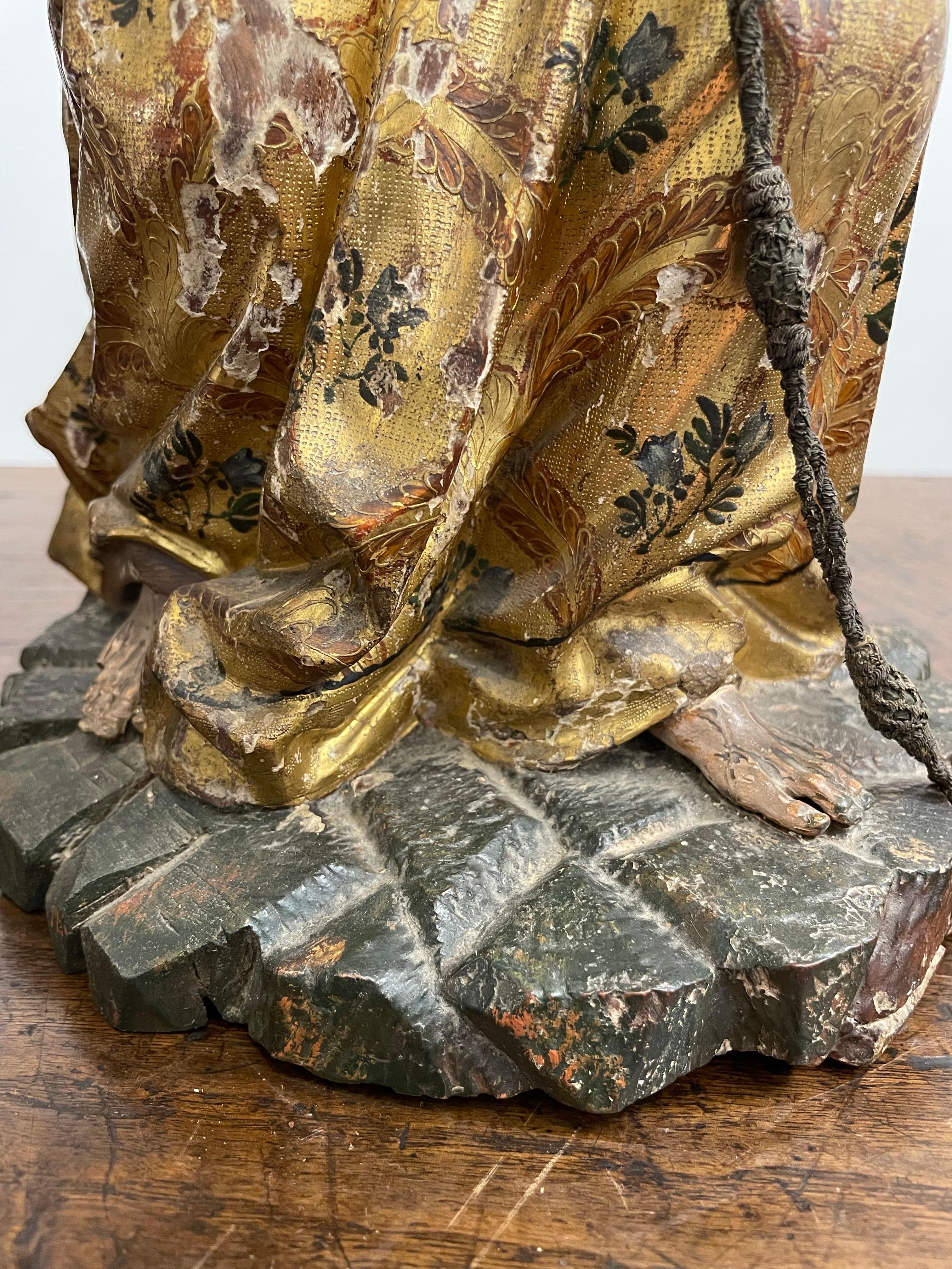 A Spanish Giltwood Polychrome Decorated Figure of a Saint, Early 19th Century For Sale 5