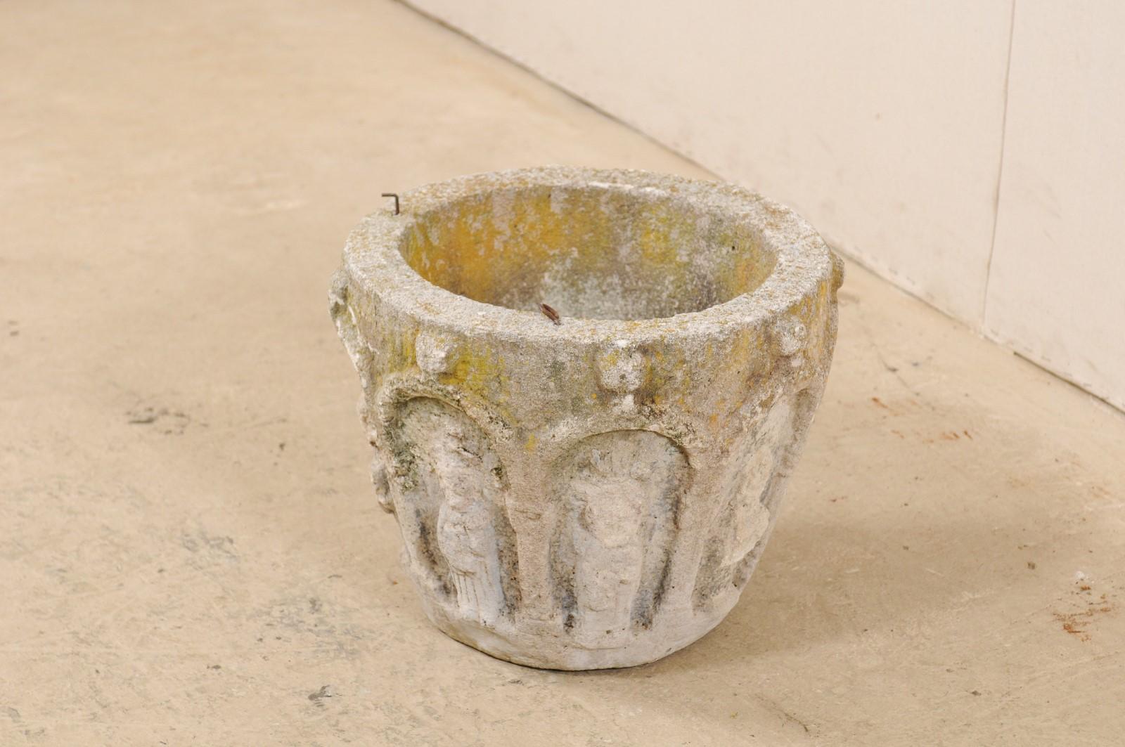 Spanish Stone Planter Adorned with Figures and Archways, Early 20th Century In Good Condition In Atlanta, GA