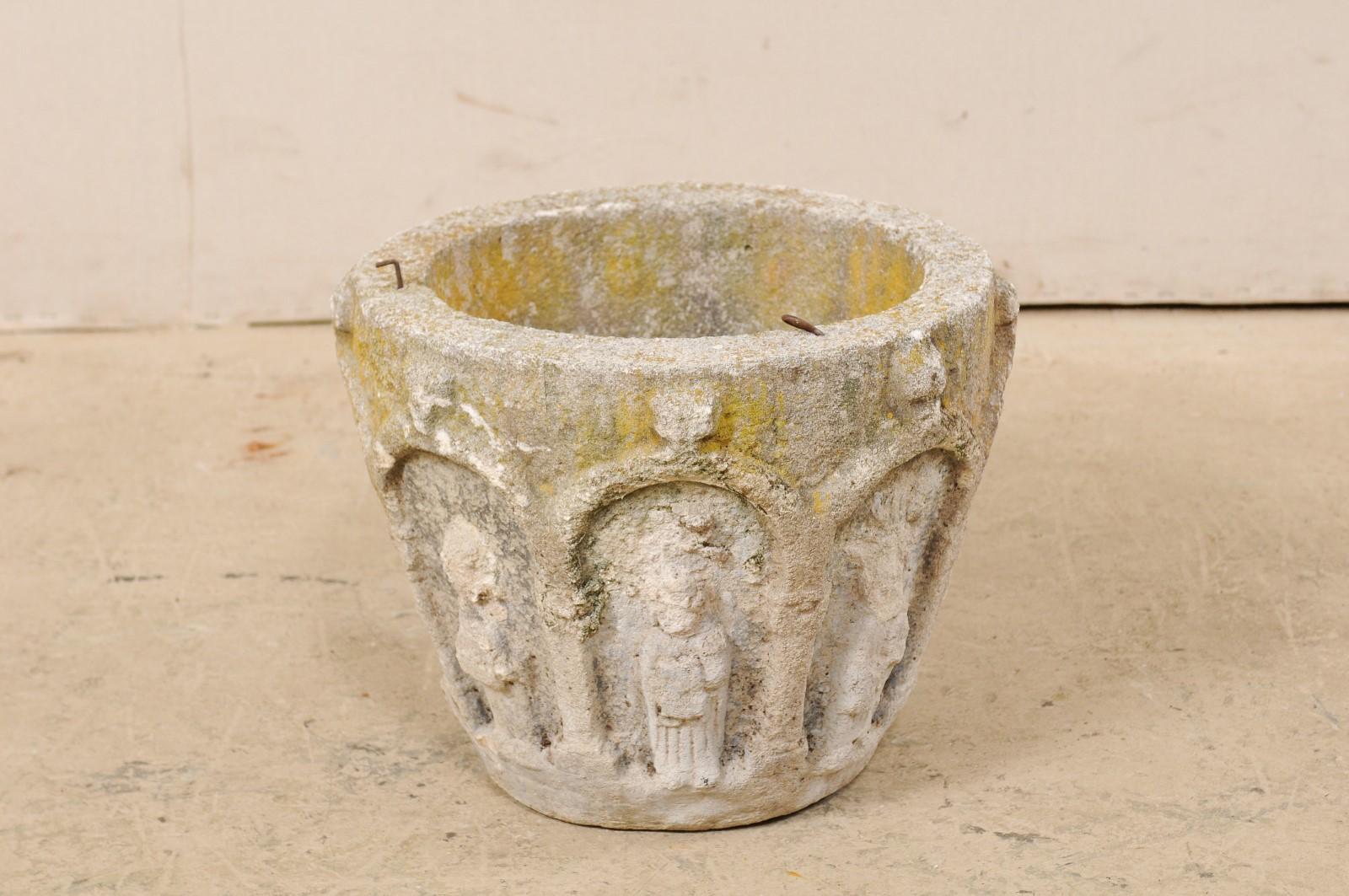 Cast Stone Spanish Stone Planter Adorned with Figures and Archways, Early 20th Century