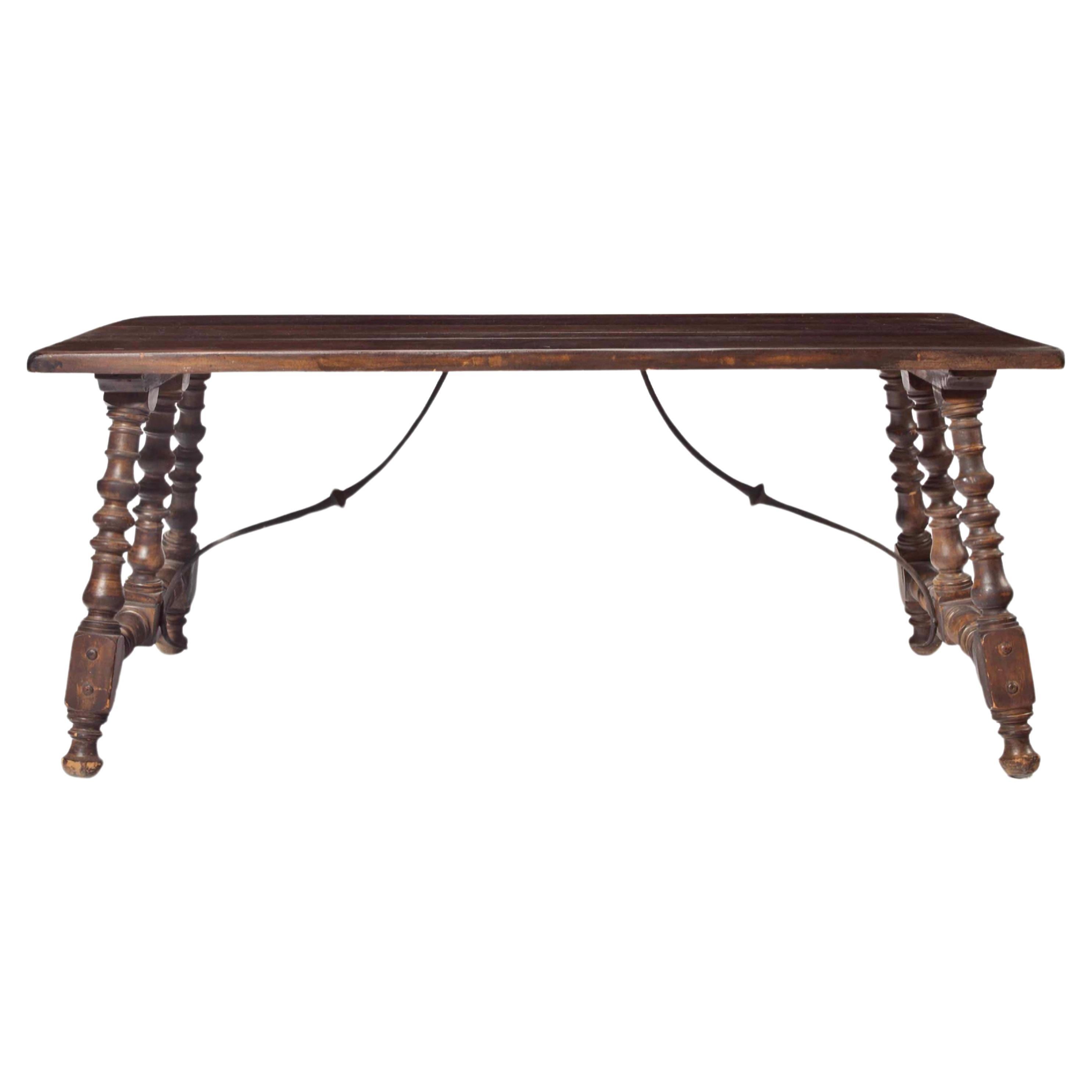 A Spanish Style Stained-Fruitwood Trestle Table, 20th Century For Sale