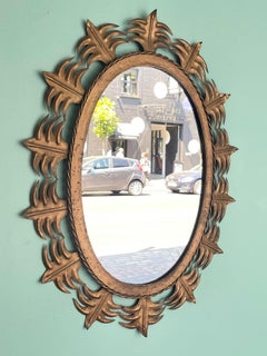 Spanish Sunburst 1950s Gilt Metal Oval Mirror with Ornate Edging