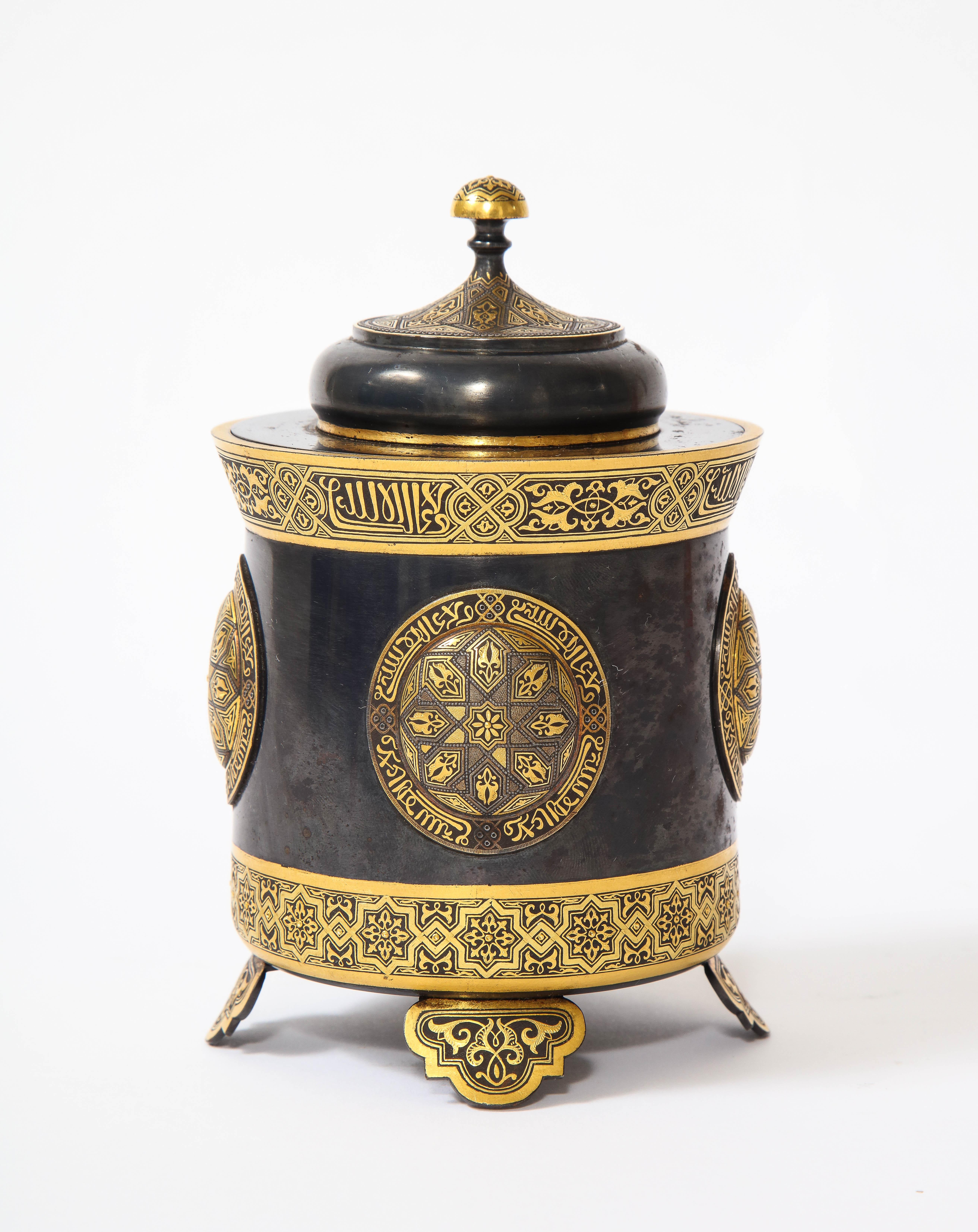 A beautiful Spanish Toledo gold and platinum inlaid damascene iron covered box centerpiece. Beautifully made with the damascene technique with platinum and gold inlayed into the patinated iron body. The piece is made in Spain for the Islamic market,