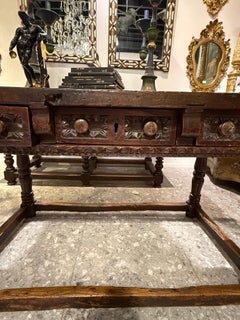 A Spanish Walnut Carved Refectory Table, 18th Century