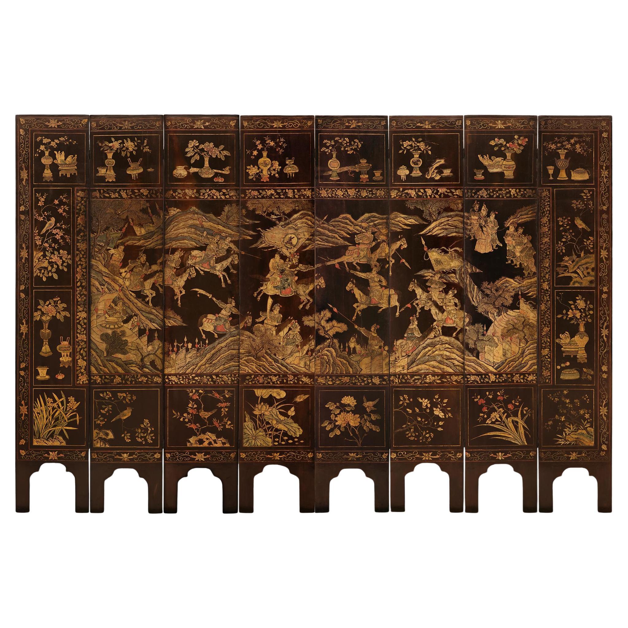 A spectacular Chinese 18th century Coromandel Lacquered 8-panel floor screen