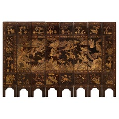 A spectacular Chinese 18th century Coromandel Lacquered 8-panel floor screen