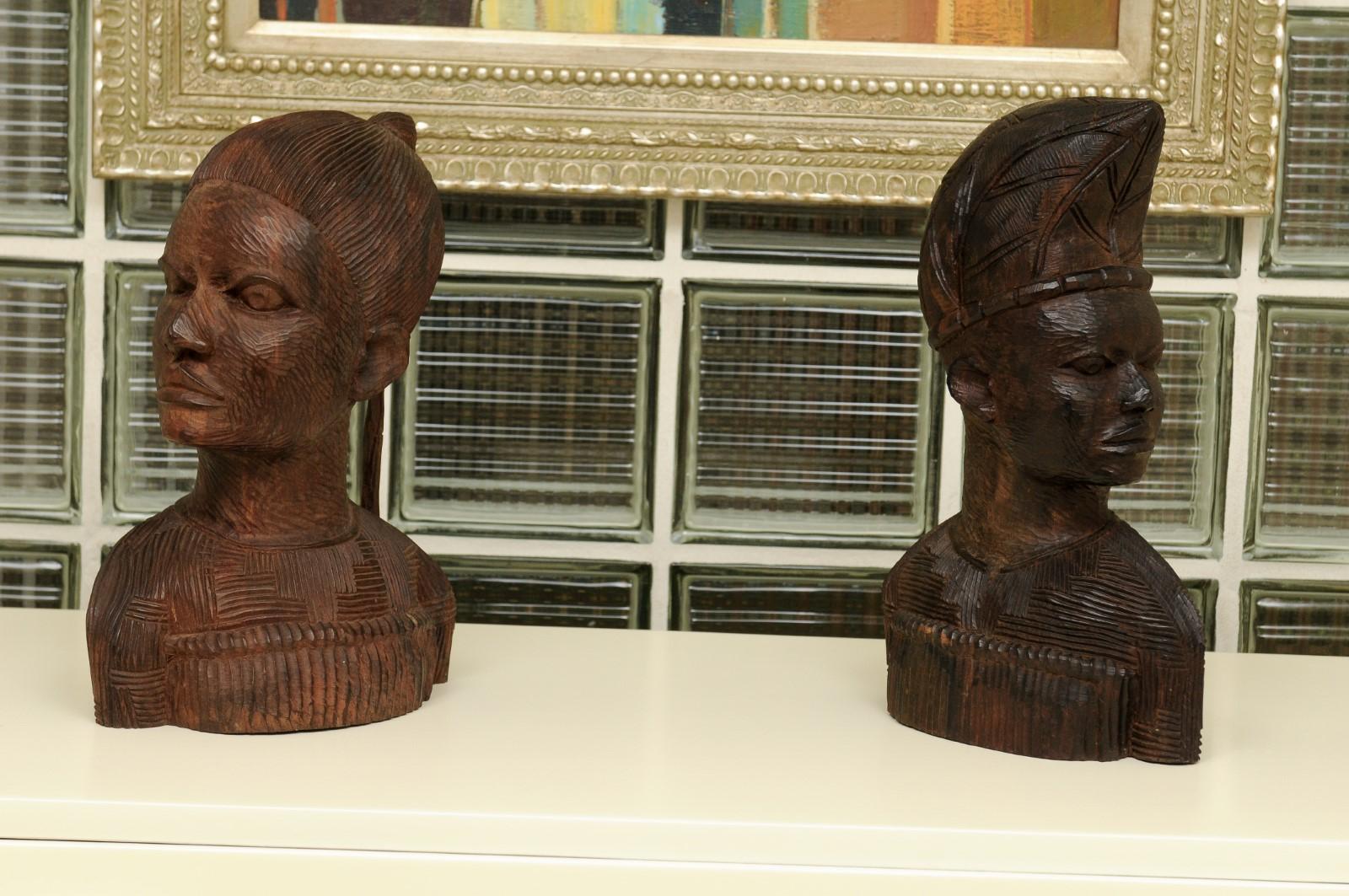 Unknown Spectacular Pair of Hand Carved Mahogany Tribal Busts, circa 1930