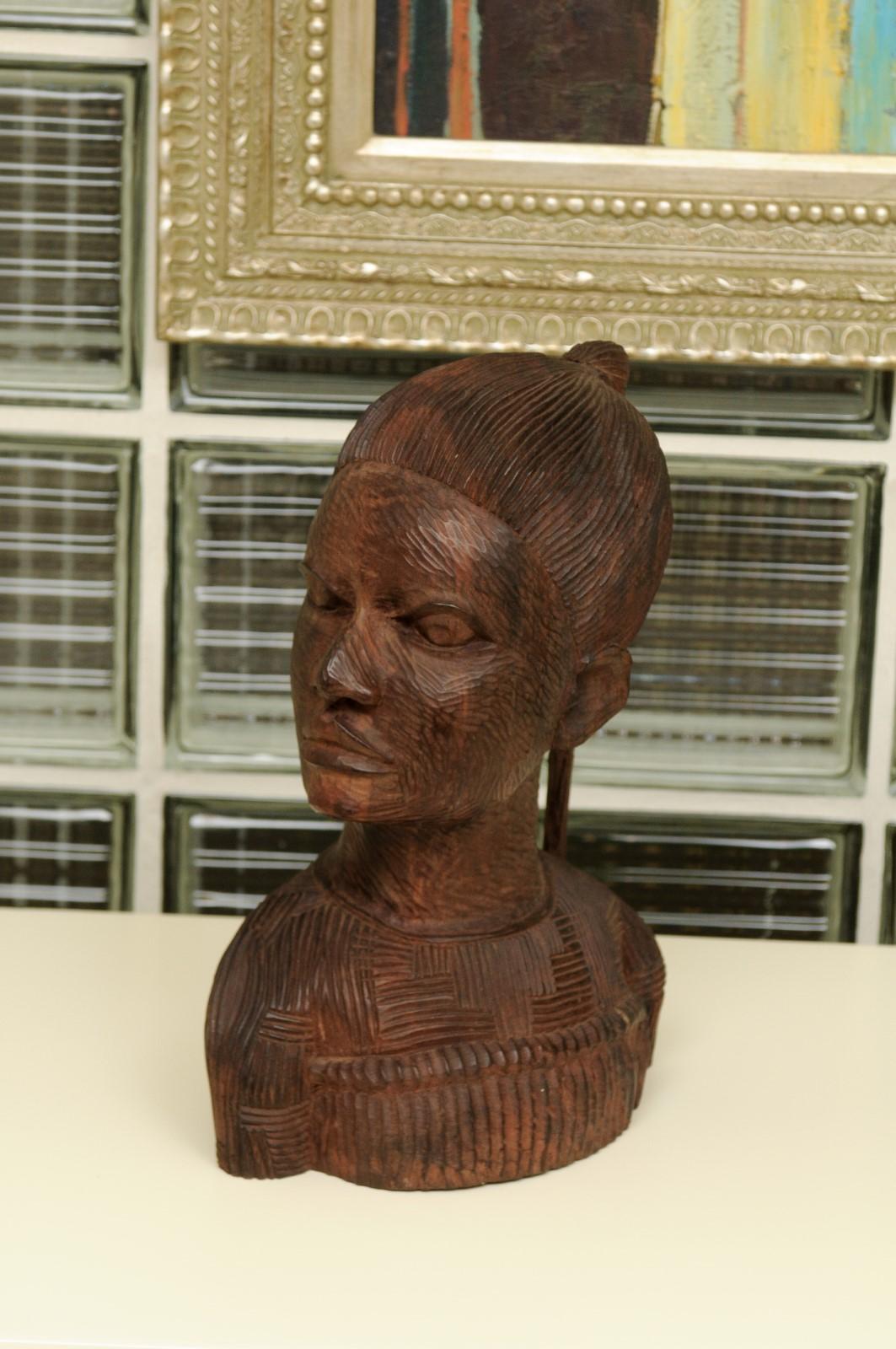 Spectacular Pair of Hand Carved Mahogany Tribal Busts, circa 1930 In Excellent Condition In Atlanta, GA